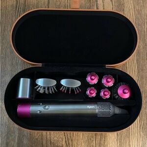 Dyson Hair Styling Kit with Vibrant Pink Highlights